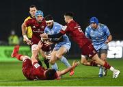 18 December 2021; Pierre Aguillon of Castres Olympique is tackled by Jean Kleyn, bottom, and Conor Murray of Munster during the Heineken Champions Cup Pool B match between Munster and Castres Olympique at Thomond Park in Limerick. Photo by David Fitzgerald/Sportsfile