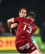 18 December 2021; Benjamin Urdapilleta of Castres Olympique is tackled by Chris Farrell of Munster during the Heineken Champions Cup Pool B match between Munster and Castres Olympique at Thomond Park in Limerick. Photo by David Fitzgerald/Sportsfile
