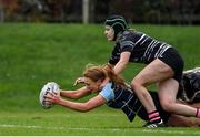 18 December 2021; Sasha Guirey of Navan RFC scores a try against Dundalk RFC during the plate after the Bank of Ireland Leinster Rugby 18s Girls' Plate Final match between Dundalk RFC and Navan RFC at Carlow IT in Carlow. Photo by Matt Browne/Sportsfile