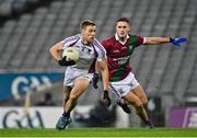 18 December 2021; Paul Mannion of Kilmacud Crokes in action against Patrick O'Sullivan of Portarlington during the AIB Leinster GAA Football Senior Club Championship Semi-Final match between Portarlington and Kilmacud Crokes at Croke Park in Dublin. Photo by Seb Daly/Sportsfile
