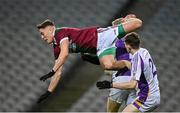 18 December 2021; Sean Byrne of Portarlington in action against Kilmacud Crokes goalkeeper Conor Ferris and Micheal Mullin during the AIB Leinster GAA Football Senior Club Championship Semi-Final match between Portarlington and Kilmacud Crokes at Croke Park in Dublin. Photo by Seb Daly/Sportsfile