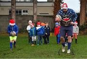 19 December 2021; Coach Kenny McInerney with participants during the Leinster Rugby Minis Christmas themed training session at St Marys RFC in Dublin. Photo by Seb Daly/Sportsfile