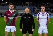 18 December 2021; Referee John Hickey with the two captains, Keith Bracken of Portarlington and Shane Cunningham of Kilmacud Crokes, before the AIB Leinster GAA Football Senior Club Championship Semi-Final match between Portarlington and Kilmacud Crokes at Croke Park in Dublin. Photo by Ray McManus/Sportsfile