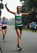 19 December 2021; Savanagh O'Callaghan of Tuam AC celebrates as she crosses the line to win the U14 3km at the Irish Life Health National 35km Race Walks Championship at Saint Anne's Park in Raheny, Dublin. Photo by Seb Daly/Sportsfile