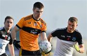 19 December 2021; Sean Quilter of Austin Stacks in action against Brian O’Sullivan of Newcastlewest during the AIB Munster GAA Football Senior Club Football Championship Semi-Final match between Austin Stacks and Newcastle West at Austin Stack Park in Tralee, Kerry. Photo by Brendan Moran/Sportsfile