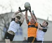 19 December 2021; Kieran Donaghy of Austin Stacks in action against Darren O’Doherty, left, and Steven Hurley of Newcastlewest during the AIB Munster GAA Football Senior Club Football Championship Semi-Final match between Austin Stacks and Newcastle West at Austin Stack Park in Tralee, Kerry. Photo by Brendan Moran/Sportsfile