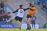 19 December 2021; Brendan O'Sullivan of Austin Stacks is tackled by Michael O’Keefe of Newcastlewest during the AIB Munster GAA Football Senior Club Football Championship Semi-Final match between Austin Stacks and Newcastle West at Austin Stack Park in Tralee, Kerry. Photo by Brendan Moran/Sportsfile