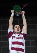 19 December 2021; Slaughtneil captain Cormac O'Doherty lifts the cup after his side's victory in the AIB Ulster GAA Hurling Senior Club Championship Final match between Ballycran and Slaughtneil at Corrigan Park in Belfast. Photo by Ramsey Cardy/Sportsfile