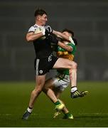 19 December 2021; Ryan McEvoy of Kilcoo in action against Eunan Mulholland of Glen during the AIB Ulster GAA Football Club Senior Championship Semi-Final match between Glen and Kilcoo at Athletic Grounds in Armagh. Photo by David Fitzgerald/Sportsfile