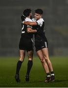 19 December 2021; Shealin Johnston, right, and Niall Brannigan of Kilcoo celebrate at the final whistle after the AIB Ulster GAA Football Club Senior Championship Semi-Final match between Glen and Kilcoo at Athletic Grounds in Armagh. Photo by David Fitzgerald/Sportsfile