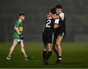19 December 2021; Shealin Johnston, right, and Niall Brannigan of Kilcoo celebrate at the final whistle after the AIB Ulster GAA Football Club Senior Championship Semi-Final match between Glen and Kilcoo at Athletic Grounds in Armagh. Photo by David Fitzgerald/Sportsfile