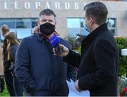 26 December 2021; Trainer Gordon Elliott with RTÉ commentator Brendan McArdle after sending Fil Dor to win The Knight Frank Juvenile Hurdle day one of the Leopardstown Christmas Festival at Leopardstown Racecourse in Dublin. Photo by Matt Browne/Sportsfile