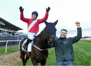 26 December 2021; Paul Townend on Ferny Hollow with groom Paul Roche celebrate after winning The Racing Post Novice Steeplechase on day one of the Leopardstown Christmas Festival at Leopardstown Racecourse in Dublin. Photo by Matt Browne/Sportsfile