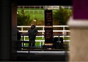 27 December 2021; A bookmaker awaits the start of the Paddy Power 'We Love A Good Christmas Jumper' 3 year old Maiden Hurdle on day two of the Leopardstown Christmas Festival at Leopardstown Racecourse in Dublin. Photo by Eóin Noonan/Sportsfile