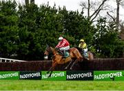 27 December 2021; Mt Leinster, with Sean O'Keeffe up, lead Haut En Couleurs, with Paul Townend up, over the second last during the Paddy Power Games Beginners Steeplechase on day two of the Leopardstown Christmas Festival at Leopardstown Racecourse in Dublin. Photo by Eóin Noonan/Sportsfile