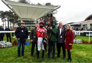 27 December 2021; Jockey Jack Kennedy and Mighty Potter, alongside trainer Gordon Elliott, second from left, with winning connections after they won the Paddy Power Future Champions Novice Hurdle on day two of the Leopardstown Christmas Festival at Leopardstown Racecourse in Dublin. Photo by Eóin Noonan/Sportsfile