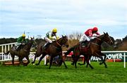 27 December 2021; Mighty Potter, with Jack Kennedy up, on their way to winning the Paddy Power Future Champions Novice Hurdle from second place Three Stripe Life, with Davy Russell up, and third place Farout, with Sean O'Keeffe up, on day two of the Leopardstown Christmas Festival at Leopardstown Racecourse in Dublin. Photo by Eóin Noonan/Sportsfile