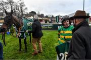 27 December 2021; Jockey Sean Flanagan, second from right, speaks to trainer Noel Meade after winning the Paddy Power Steeplechase on School Boy Hours on day two of the Leopardstown Christmas Festival at Leopardstown Racecourse in Dublin. Photo by Eóin Noonan/Sportsfile