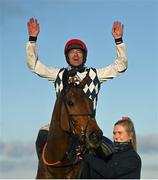 28 December 2021; Jockey Davy Russell and groom Carly Scott celebrate with Galvin after winning the Savills Steeplechase on day three of the Leopardstown Christmas Festival at Leopardstown Racecourse in Dublin. Photo by Seb Daly/Sportsfile