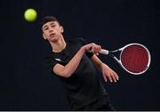 28 December 2021; Adrian Lynch during his Boys U16 Singles Round of 32 match against Aaron Breen during the Shared Access National Indoor Tennis Championships 2022 at David Lloyd Riverview in Dublin. Photo by Ramsey Cardy/Sportsfile
