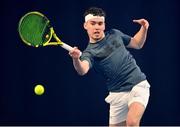 28 December 2021; Harry Scott during his Boys U16 Singles Round of 32 match against Alex Garvin during the Shared Access National Indoor Tennis Championships 2022 at David Lloyd Riverview in Dublin. Photo by Ramsey Cardy/Sportsfile