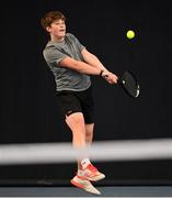 28 December 2021; Alex Garvin during his Boys U16 Singles Round of 32 match against Harry Scott during the Shared Access National Indoor Tennis Championships 2022 at David Lloyd Riverview in Dublin. Photo by Ramsey Cardy/Sportsfile