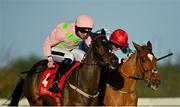 29 December 2021; Sharjah, left, with Patrick Mullins up, on their way to winning the Matheson Hurdle, from second place Zanahiyr, with Jack Kennedy up, on day four of the Leopardstown Christmas Festival at Leopardstown Racecourse in Dublin. Photo by Seb Daly/Sportsfile