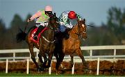 29 December 2021; Sharjah, left, with Patrick Mullins up, on their way to winning the Matheson Hurdle, from second place Zanahiyr, with Jack Kennedy up, on day four of the Leopardstown Christmas Festival at Leopardstown Racecourse in Dublin. Photo by Seb Daly/Sportsfile