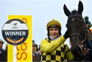 1 January 2022; Jockey Paul Townend and Al Boum Photo after winning the Savills New Year's Day Steeplechase at Tramore Racecourse in Waterford. Photo by Seb Daly/Sportsfile
