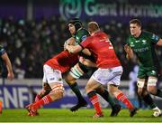 1 January 2022; Ultan Dillane of Connacht is tackled by Jean Kleyn, left, and Stephen Archer of Munster during the United Rugby Championship match between Connacht and Munster at The Sportsground in Galway. Photo by Brendan Moran/Sportsfile