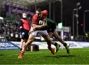 1 January 2022; Andrew Conway of Munster is tackled by Mack Hansen of Connacht during the United Rugby Championship match between Connacht and Munster at The Sportsground in Galway. Photo by Eóin Noonan/Sportsfile