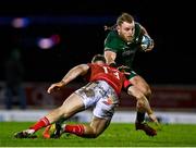 1 January 2022; Finlay Bealham of Connacht is tackled by Chris Farrell of Munster during the United Rugby Championship match between Connacht and Munster at The Sportsground in Galway. Photo by Eóin Noonan/Sportsfile