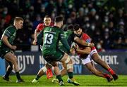 1 January 2022; Damian de Allende of Munster is tackled by Bundee Aki of Connacht during the United Rugby Championship match between Connacht and Munster at The Sportsground in Galway. Photo by Brendan Moran/Sportsfile