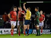1 January 2022; Chris Farrell of Munster, second from left, is shown a yellow card by referee Chris Busby during the United Rugby Championship match between Connacht and Munster at The Sportsground in Galway. Photo by Brendan Moran/Sportsfile