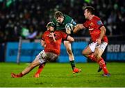 1 January 2022; Kieran Marmion of Connacht is tackled by Alex Kendellen, left, and Niall Scannell of Munster during the United Rugby Championship match between Connacht and Munster at The Sportsground in Galway. Photo by Eóin Noonan/Sportsfile