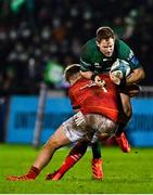 1 January 2022; Kieran Marmion of Connacht is tackled by Alex Kendellen of Munster during the United Rugby Championship match between Connacht and Munster at The Sportsground in Galway. Photo by Eóin Noonan/Sportsfile