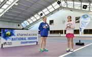 3 January 2022; Sienna MacCarthy, left, and Alicia Sutton, with their medals after the Girls U12 Singles Final match during the Shared Access National Indoor Tennis Championships 2022 at David Lloyd Riverview in Dublin. Photo by Sam Barnes/Sportsfile