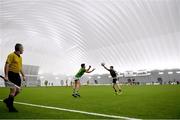 3 January 2022; Keelin Cawley of Sligo in action against Emlyn Mulligan of Leitrim during the Connacht FBD League Preliminary Round match between Leitrim and Sligo at the NUI Galway Connacht GAA Air Dome in Bekan, Mayo. Photo by Ramsey Cardy/Sportsfile