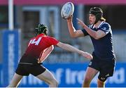 4 January 2022; Dylan O'Keefe of North Midlands in action against Cathal Magee of North East during the Bank of Ireland Leinster Rugby Shane Horgan Cup Round 4 match between North East and North Midlands at Energia Park in Dublin. Photo by Piaras Ó Mídheach/Sportsfile