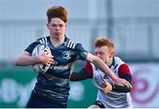 4 January 2022; Adam Gray of Metro in action against Jude Auld of Midlands during the Bank of Ireland Leinster Rugby Shane Horgan Cup Round 4 match between Metro and Midlands at Energia Park in Dublin. Photo by Piaras Ó Mídheach/Sportsfile