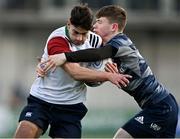 4 January 2022; Jack Boyan of Midlands is tackled by Mark Cleary of Metro during the Bank of Ireland Leinster Rugby Shane Horgan Cup Round 4 match between Metro and Midlands at Energia Park in Dublin. Photo by Piaras Ó Mídheach/Sportsfile