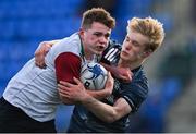 4 January 2022; Sam Mills of Midlands is tackled by Ethan Fennell of Metro during the Bank of Ireland Leinster Rugby Shane Horgan Cup Round 4 match between Metro and Midlands at Energia Park in Dublin. Photo by Piaras Ó Mídheach/Sportsfile