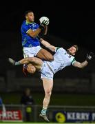 5 January 2022; Stefan Okunbor of Kerry catches the throw-in ahead of Darragh Tracey of Limerick during the McGrath Cup Group B match between Kerry and Limerick at Austin Stack Park in Tralee, Kerry. Photo by Brendan Moran/Sportsfile