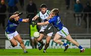 5 January 2022; Rory O’Brien of Limerick is tackled by Dara Moynihan, left, and Pa Warren of Kerry during the McGrath Cup Group B match between Kerry and Limerick at Austin Stack Park in Tralee, Kerry. Photo by Brendan Moran/Sportsfile