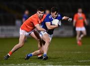 6 January 2022; Luke Fortune of Cavan in action against Greg McCabe of Armagh during the Dr McKenna Cup Round 1 match between Cavan and Armagh at Kingspan Breffni in Cavan. Photo by David Fitzgerald/Sportsfile