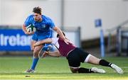 7 January 2022; David Hawkshaw of Leinster is tackled by Ben Brownlee of Ireland during a development match between Leinster A and Ireland U20 at Energia Park in Dublin. Photo by Harry Murphy/Sportsfile