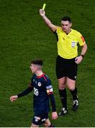 28 November 2021; Referee Robert Hennessy issues a yellow card to Darragh Burns of St Patrick's Athletic during the Extra.ie FAI Cup Final match between Bohemians and St Patrick's Athletic at Aviva Stadium in Dublin. Photo by Ben McShane/Sportsfile