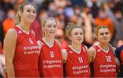 7 January 2022; Singleton's SuperValu Brunell players, from left, Shannon Ryan, Lauryn Homan, Edel Thornton and Simone O'Shea stand for Amhrán na bhFiann before the InsureMyHouse.ie Paudie O’Connor Cup semi-final match between The Address UCC Glanmire and Singleton's SuperValu Brunell at Neptune Stadium in Cork. Photo by Brendan Moran/Sportsfile