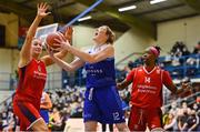 7 January 2022; Miriam Loughrey of The Address UCC Glanmire attempts a lay-up under pressure from Shannon Ryan, left, and Kwanza Murray of Singleton Supervalu Brunell during the InsureMyHouse.ie Paudie O’Connor Cup semi-final match between The Address UCC Glanmire and Singleton's SuperValu Brunell at Neptune Stadium in Cork. Photo by Sam Barnes/Sportsfile