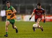 7 January 2022; Andrew Gilmore of Down in action against Caolan Ward of Donegal during the Dr McKenna Cup Round 1 match between Donegal and Down at Pairc MacCumhaill in Ballybofey, Donegal. Photo by Ramsey Cardy/Sportsfile